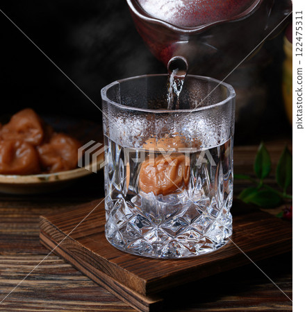 Shochu with plum Shochu with plum 122475311