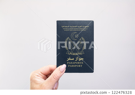 Sahrawi Passport Held Against Simple White Background. Astana, Kazakhstan, 26 october 2024 122476328
