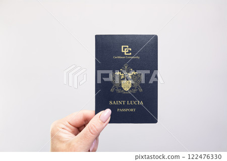 Passport Saint Lucia Held Against Simple White Background. Astana, Kazakhstan, 26 october 2024 Passport Saint Lucia Held Against Simple White Background. Astana, Kazakhstan, 26 october 2024 122476330
