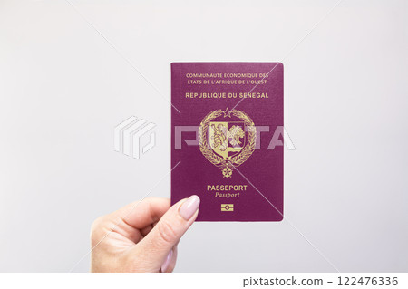 Passport Senegal Held Against Simple White Background. Astana, Kazakhstan, 26 october 2024 122476336