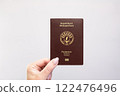 Passport Madagascar Held Against Simple White Background. Astana, Kazakhstan, 26 october 2024 122476496