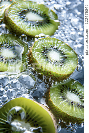 AI-generated image of a cross-section of a fresh kiwi fruit surrounded by bubbles in water 122476843