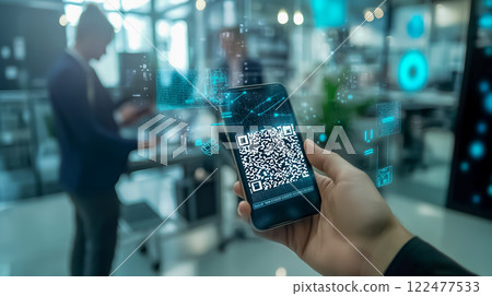 A man's hand operating a smartphone for a digital transaction using a QR code 122477533