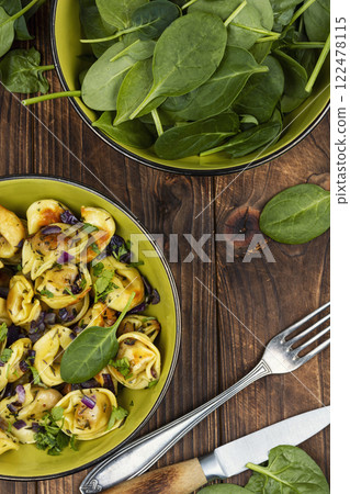 Vegan or vegetarian ravioli or dumplings. 122478115