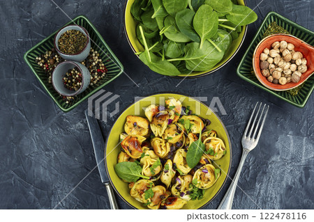 Delicious food concept with vegetarian ravioli. Delicious food concept with vegetarian ravioli. 122478116