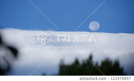 moon floating in the sea of clouds moon floating in the sea of clouds 122478937