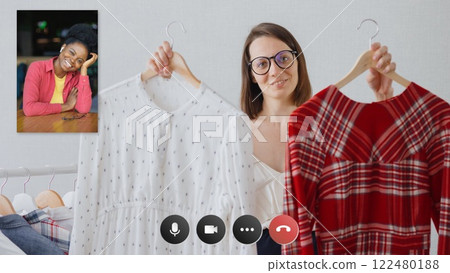 video chat on smartphone or laptop screen. video call between two people, conference to resolve work 122480188