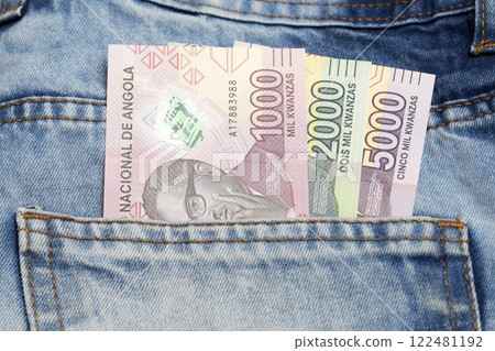Angolan Kwanza in the pocket of blue jeans Angolan Kwanza in the pocket of blue jeans 122481192