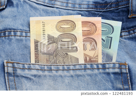 Zimbabwean dollar in the pocket of blue jeans Zimbabwean dollar in the pocket of blue jeans 122481193