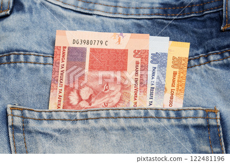 South African Rand in the pocket of blue jeans South African Rand in the pocket of blue jeans 122481196