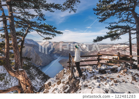 Man Tourist Enjoying Winter Landscape from Viewpoint 122481283