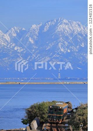 Bellmonta runs along Amaharashi Coast with the Tateyama mountain range in the background Bellmonta runs along Amaharashi Coast with the Tateyama mountain range in the background 122481516