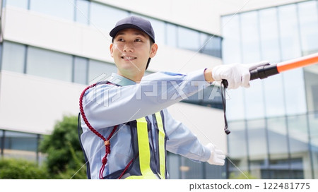 Traffic controller directing traffic 122481775