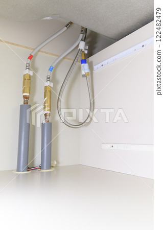 Faucet piping after replacement due to leak (before and after materials) Faucet piping after replacement due to leak (before and after materials) 122482479