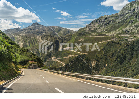 Furka Pass road, in the background the serpentines of the Grimsel Pass road, Canton of Valais, Switzerland Furka Pass road, in the background the serpentines of the Grimsel Pass road, Canton of Valais, Switzerland 122482531