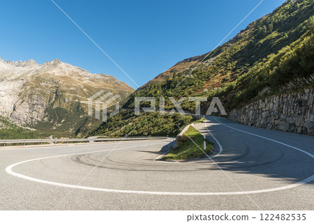 Hairpin bend on the Furka Pass road in the Swiss Alps, Canton of Valais, Switzerland Hairpin bend on the Furka Pass road in the Swiss Alps, Canton of Valais, Switzerland 122482535