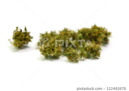 Marijuana flower isolated on white background. Cannabis plant close up. Marijuana flower isolated on white background. Cannabis plant close up. 122482678