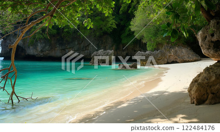 Escape to a secluded tropical beach cove with turquoise water. Sandy shore. And lush foliage. Perfect remote island getaway for a summer vacation in a natural paradise of tranquility and serenity Escape to a secluded tropical beach cove with turquoise water. Sandy shore. And lush foliage. Perfect remote island getaway for a summer vacation in a natural paradise of tranquility and serenity 122484176