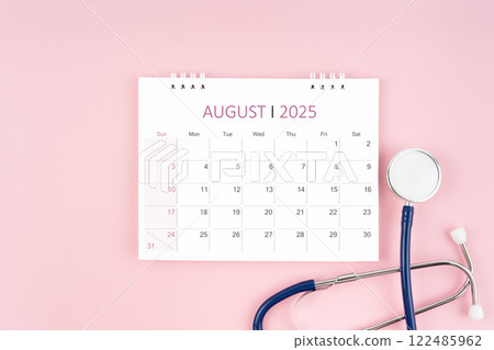 August 2025 desk calendar and stethoscope, Medical appointment concept. 122485962