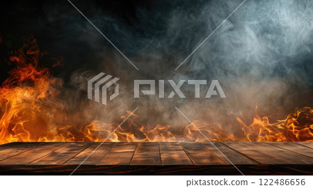 A wood burning fire with smoke and flames A wood burning fire with smoke and flames 122486656