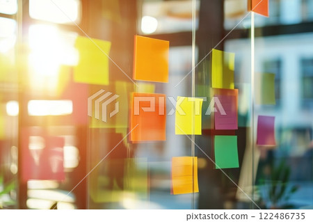 Creative Business Team Collaborating with Sticky Notes for Innovative Ideas and Solutions 122486735