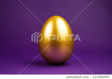 Elegant Golden Easter Egg with Smooth Metallic Finish on Purple Background 122486804