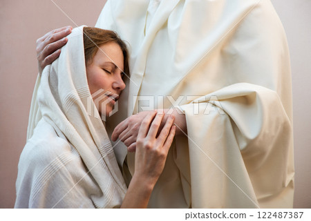Jesus hugging a praying woman Jesus hugging a praying woman 122487387