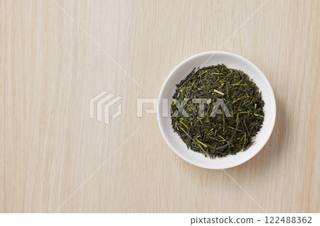 Green tea leaves on a plate 122488362