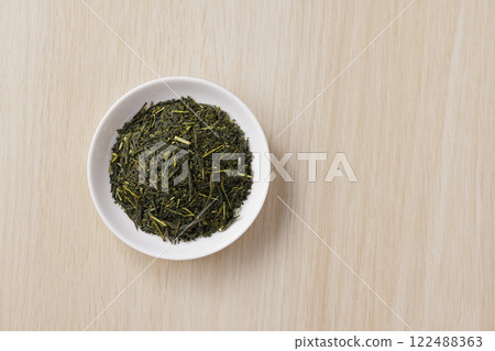 Green tea leaves on a plate Green tea leaves on a plate 122488363