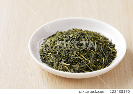 Green tea leaves on a plate 122488370
