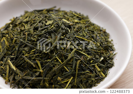 Green tea leaves on a plate Green tea leaves on a plate 122488373