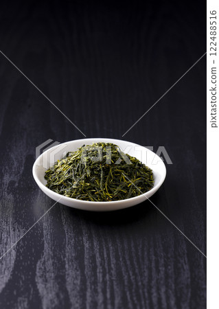 Green tea leaves on a plate 122488516