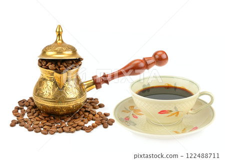 Vintage coffee pot, coffee beans and porcelain cup with drink isolated on white. Collage. Free space for text. 122488711