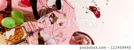Banner. Aerial view of drunk, exhausted woman in beige high hells stepping on pink fabric in messy, dirty afterparty atmosphere. Banner. Aerial view of drunk, exhausted woman in beige high hells stepping on pink fabric in messy, dirty afterparty atmosphere. 122489448