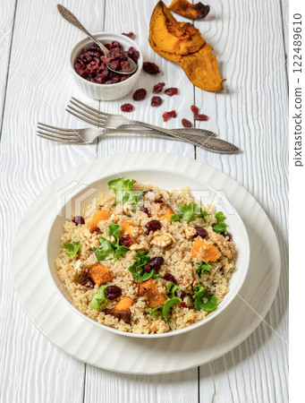 quinoa pumpkin salad in a bowl, top view 122489610