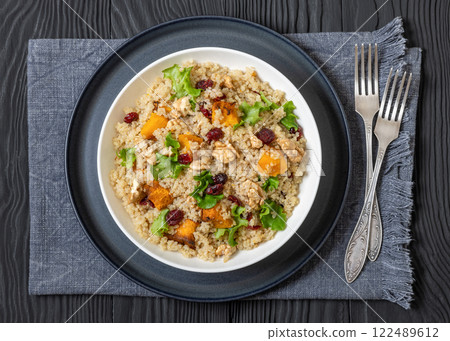 quinoa pumpkin salad in a bowl, top view 122489612