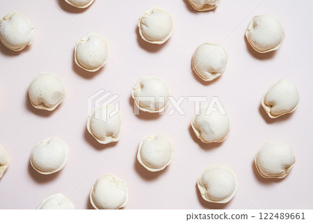 Pattern of raw dumplings. Frozen food. 122489661