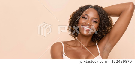 Portraits of smiling Black women with natural hairstyles, showcasing confidence and beauty 122489879