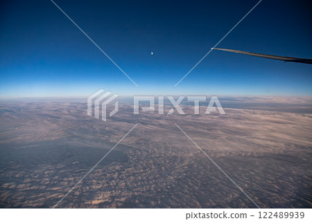 Sky seen from an airplane Sky seen from an airplane 122489939