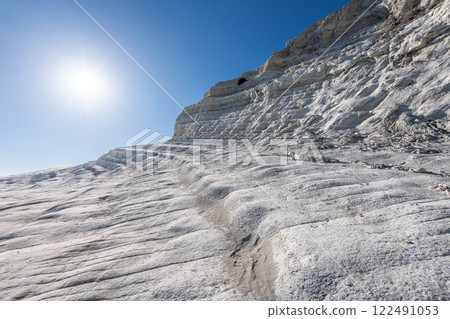 Rocky cliff of the Stair of the Turks in Agrigento, Sicily, Italy Rocky cliff of the Stair of the Turks in Agrigento, Sicily, Italy 122491053