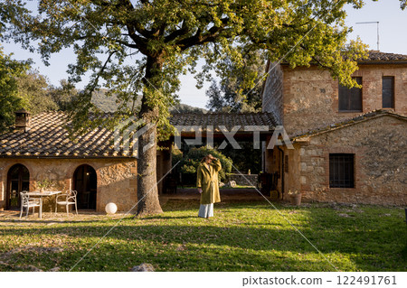 Tranquil Courtyard with Oak Tree Tranquil Courtyard with Oak Tree 122491761