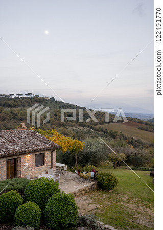 Rustic Countryside Cottage at Dusk Rustic Countryside Cottage at Dusk 122491770