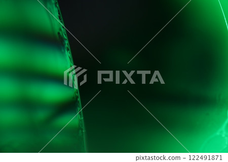 Green liquid line motion, liquid surface, surrealistic art, line of light, minimalistic background, perfect water forms, glossy panels, macro abstract photography  122491871