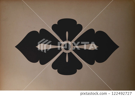Flower shaped mon printed on a paper 122492727