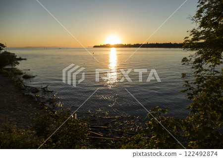 Sunset at lake Bodensee, Lindau Harbour, in Bavaria, Germany Sunset at lake Bodensee, Lindau Harbour, in Bavaria, Germany 122492874