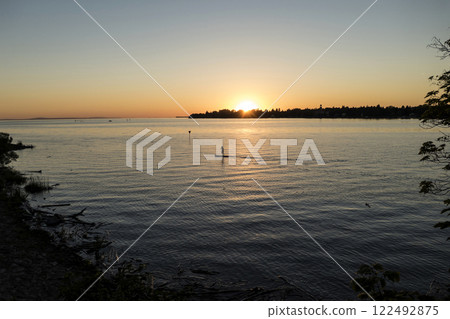 Sunset at lake Bodensee, Lindau Harbour, in Bavaria, Germany Sunset at lake Bodensee, Lindau Harbour, in Bavaria, Germany 122492875