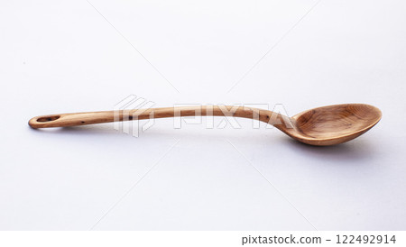 Wooden kitchen utensils stacked view close up isolated 122492914