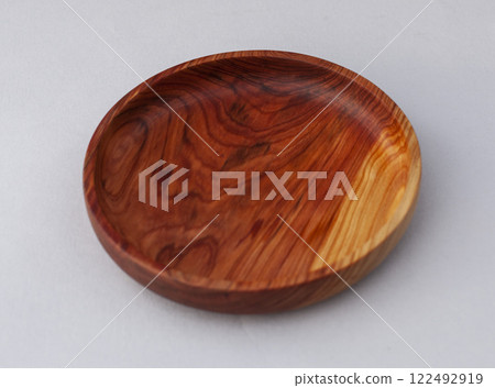 Wooden kitchen utensils stacked view close up isolated Wooden kitchen utensils stacked view close up isolated 122492919