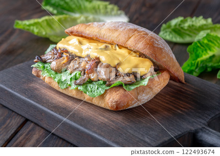 Delicious vegetarian sandwich with toasted ciabatta, fried oyster mushrooms, and yellow sauce 122493674