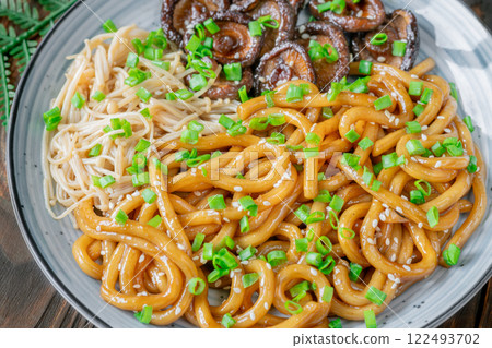 Udon Noodles with Soy Unagi Sauce, Mushrooms, and Green Onion 122493702